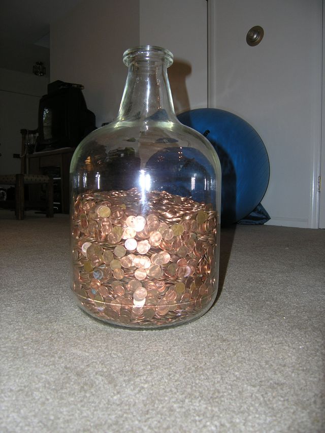 The penny jar with about 18,000 pennies in it