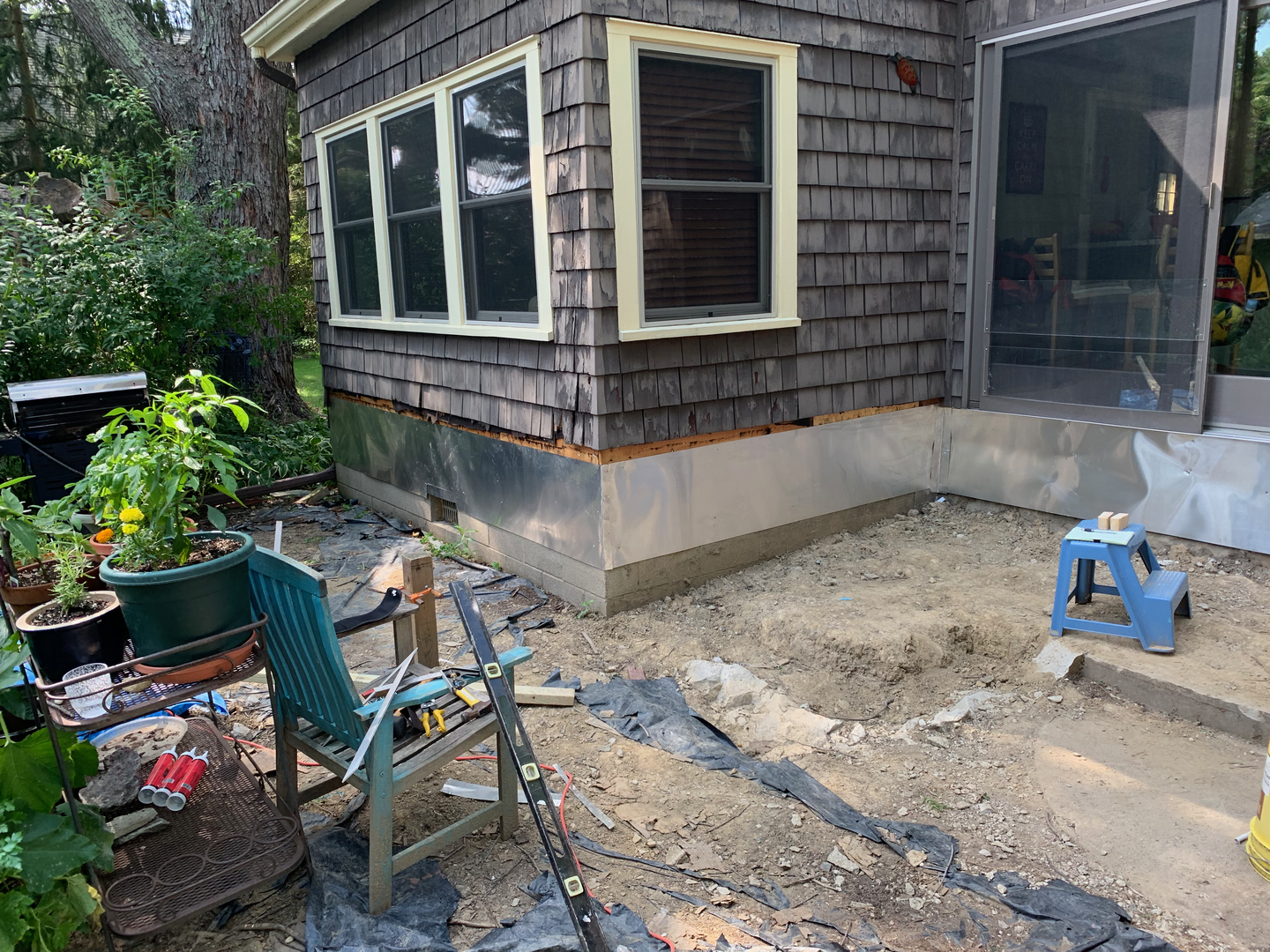 So we put up multiple layers of flashing! (House wrap, aluminum, z-flashing, flashing tape.)