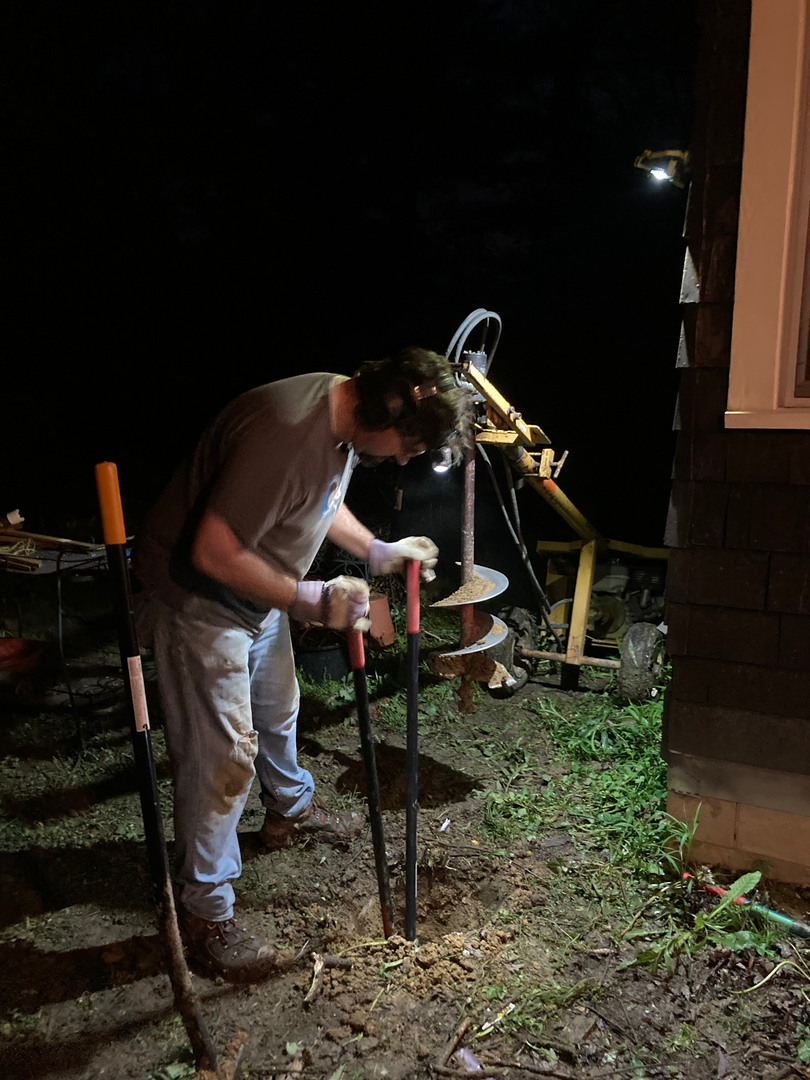 At 9:30pm, in 40-degree, rainy weather, because the concrete guys were coming the next morning!